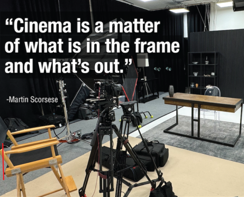 Production set at REV Studios with a black backdrop, director's chair, camera on a tripod, and a quote: "Cinema is a matter of what is in the frame and what's out." - Martin Scorsese.